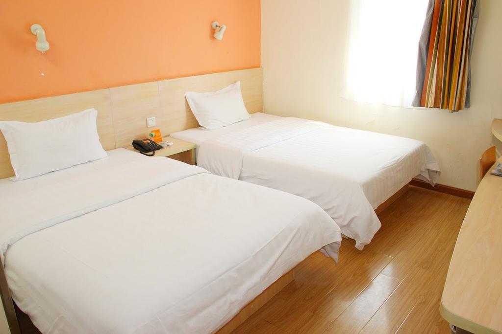 7Days Inn Qingdao Haiyunan Xinglong Road חדר תמונה