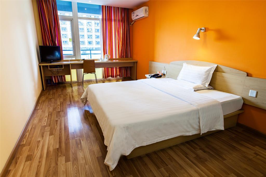 7Days Inn Qingdao Haiyunan Xinglong Road חדר תמונה